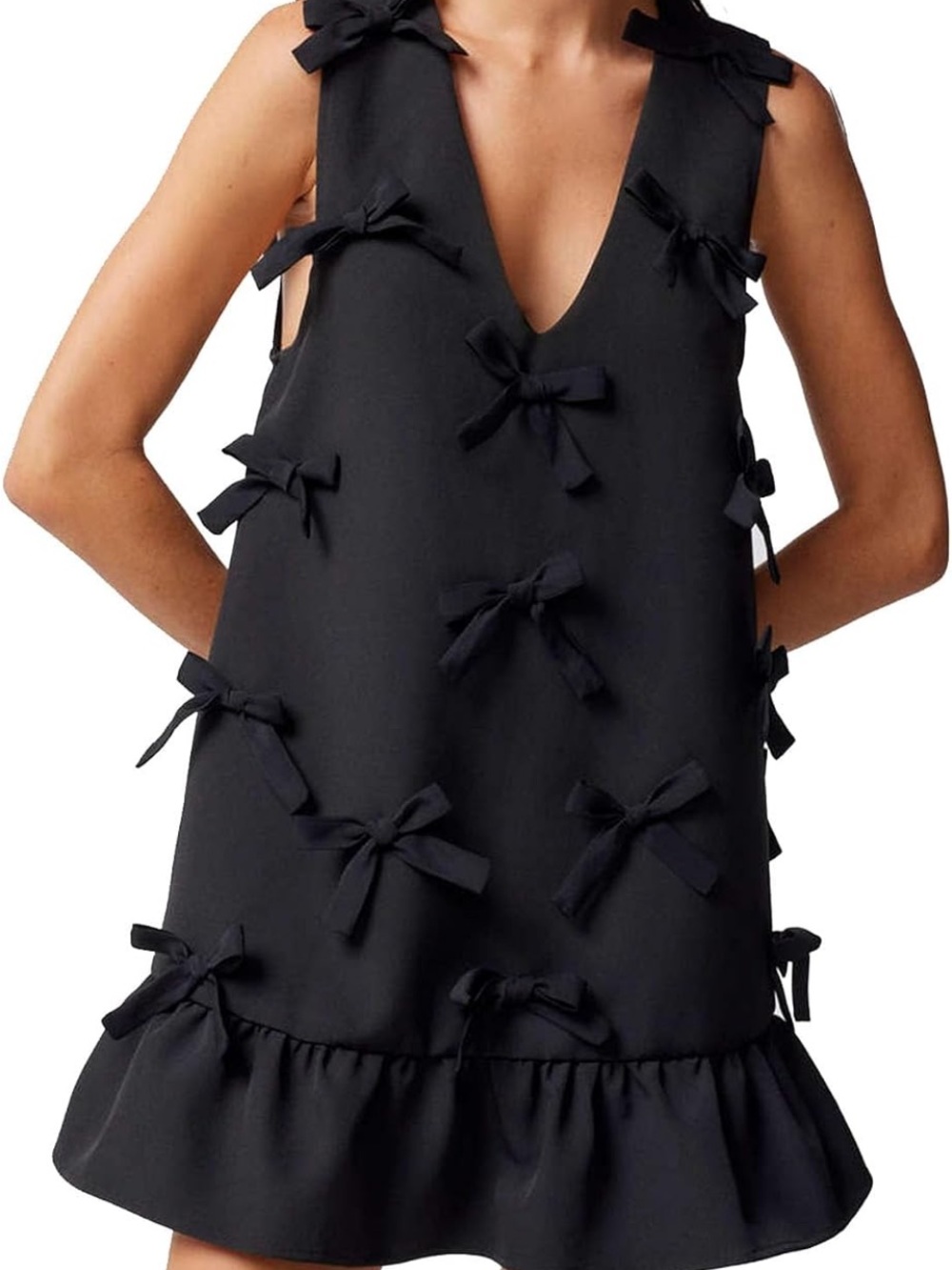 Sleeveless Black Bow-Accent mini dress